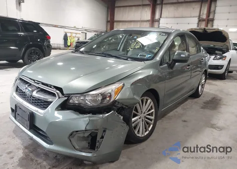 2014 Subaru Impreza Limited z USA, uszkodzony, nr VIN JF1GJAG69EH021682